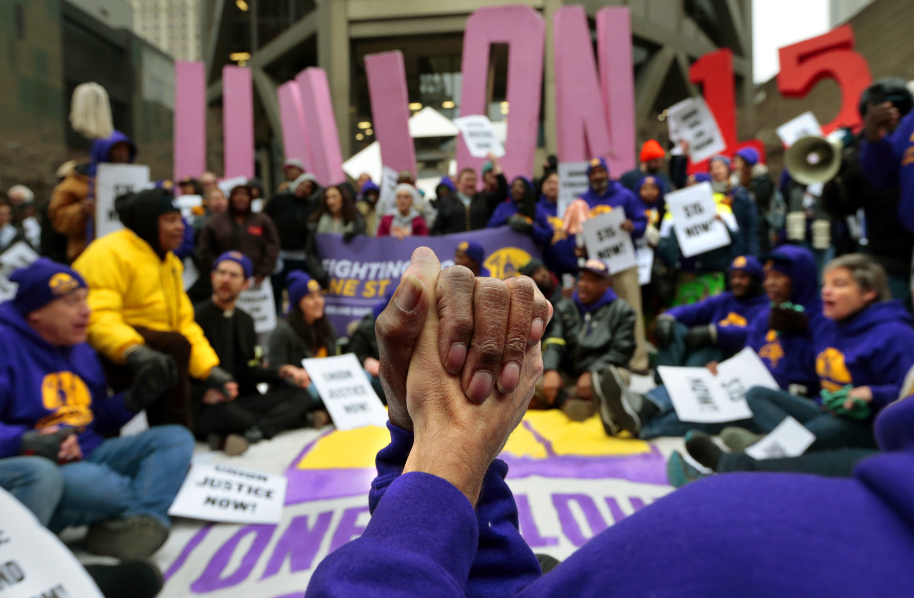 Arrests made as protesters call for pay raise for local janitors